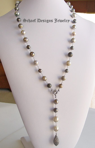 Schaef Designs Multi colored tahitian pearls lariat style necklace with pave diamond swirl pendant | New Mexico