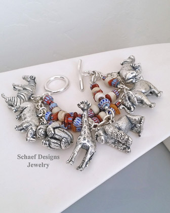 Vintage Susan Cummings sterling silver endangered species African animals 3 strand charm bracelet | Schaef Designs | Arizona 